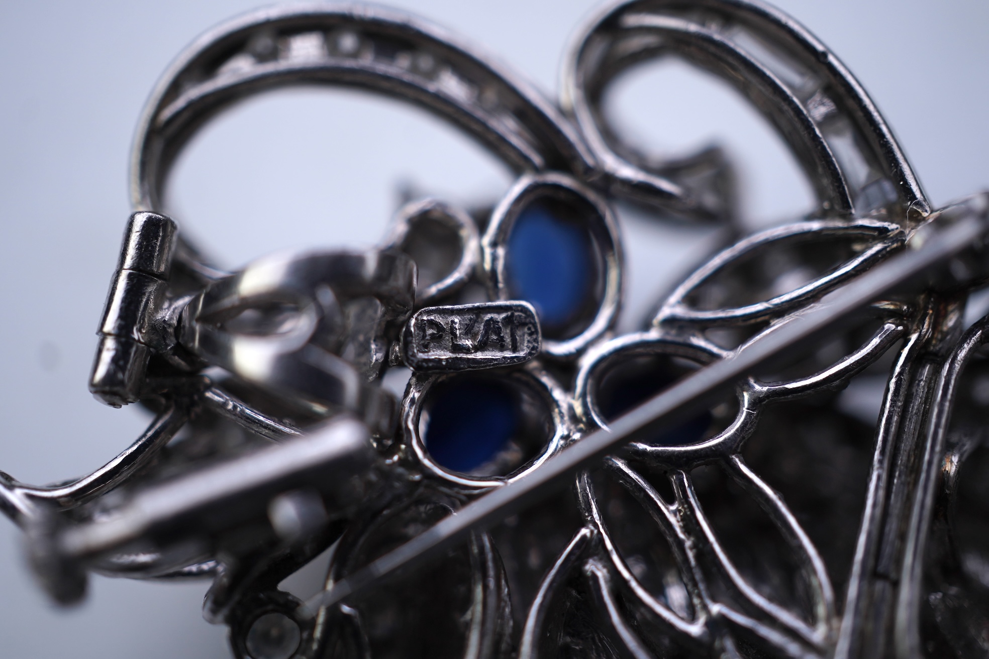 A sapphire and diamond brooch, mid 20th century